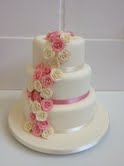 Three Tier Round Classic Cream and Pink Wedding Cake